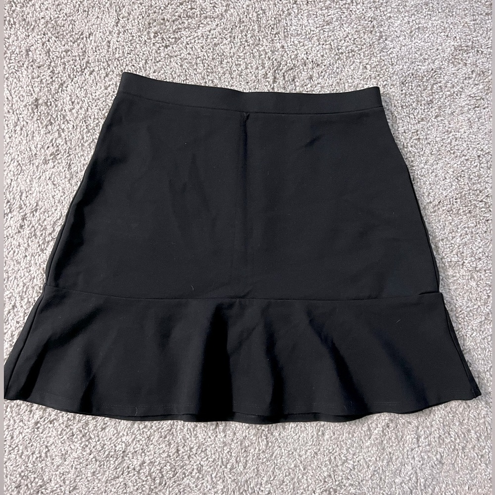 Loft black skirt with ruffle detail.